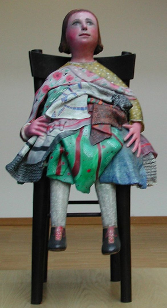Figura bambina con i panni